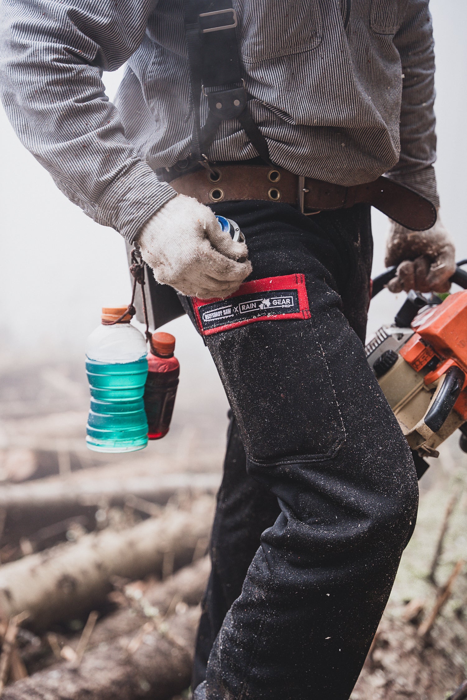 Arborist wearing the WCS x Rain Gear Pro Saw Pant in the tree