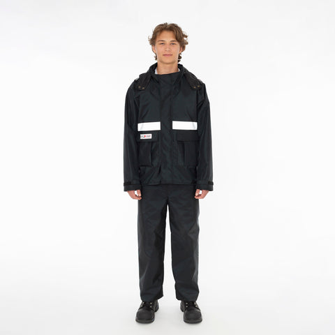 Front view of a man wearing the black Apex Unlined Rain Jacket with matching rain pants